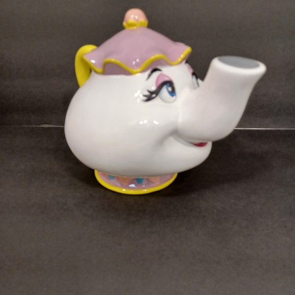 Disney Mrs. Potts tea pot piggy bank.